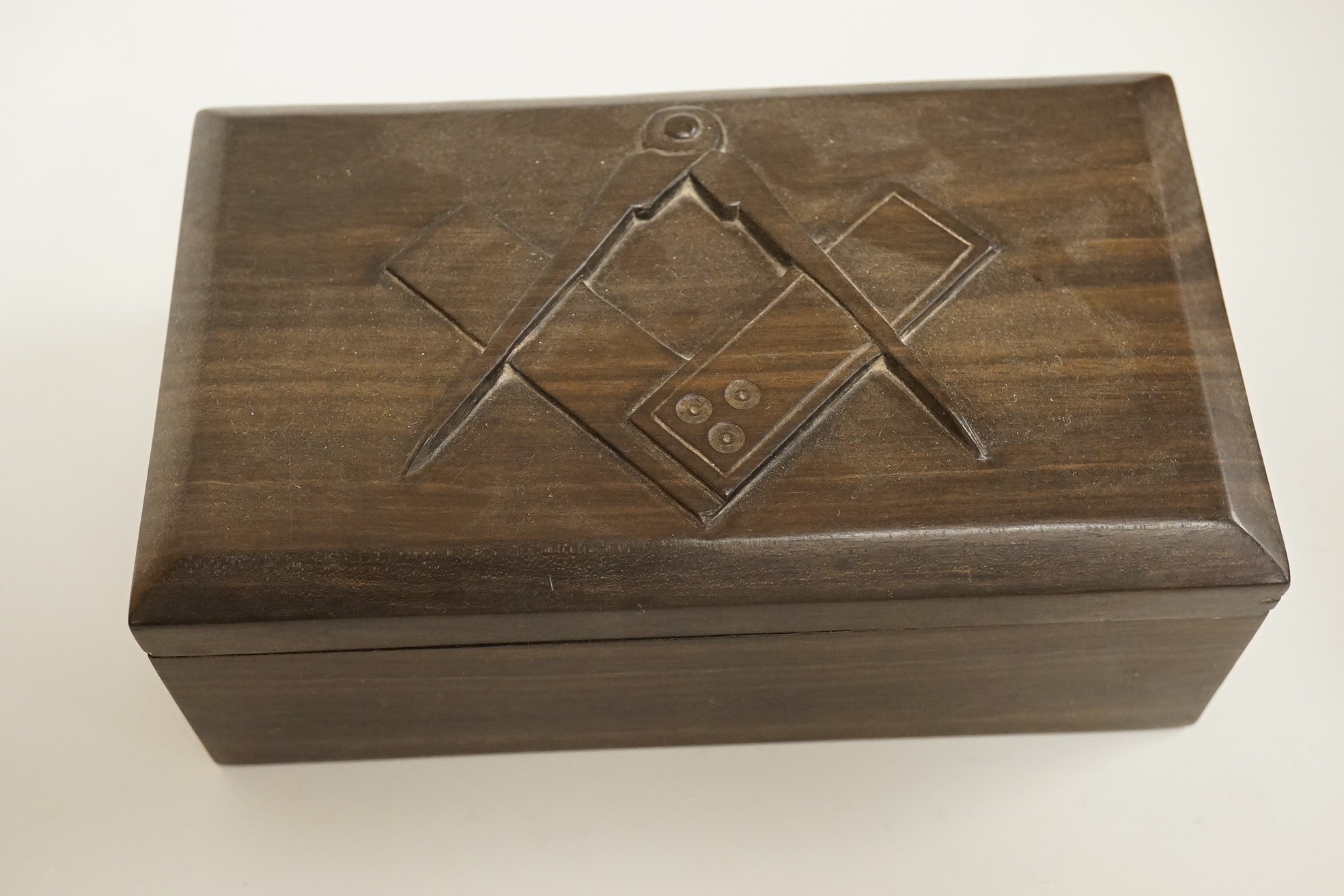 Masonic collectables including three paperweights, a cigarette box and two ribboned medals